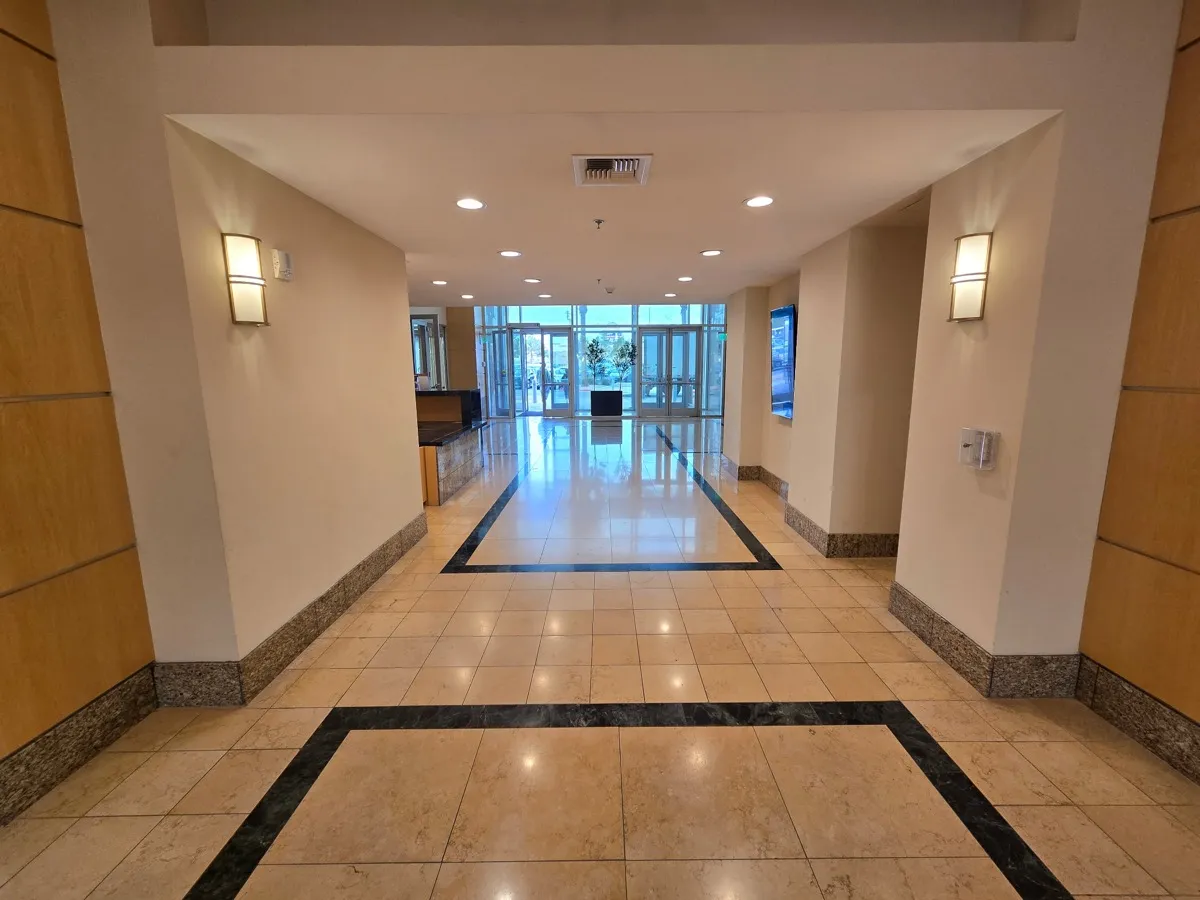Polished marble floor in a commercial hospitality lobby